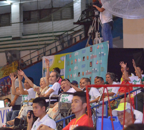 Residents from the Gasa sa Gugma-Home for the Dying Destitutes cheer for the UV Green Lancers during their game against USC last Thursday at the Cebu Coliseum. contributed photo