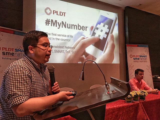 #MyNumber/may 26,2016: Marc Frederick Roxas, PLDT/Smart category Head SME Data Solutions (left) officialy announce the PLDT #MyNumber for SME here in Cebu. At right is John Thomas Anthony Nanquil, Area Sales Head. (CDN PHOTO/TONEE DESPOJO)
