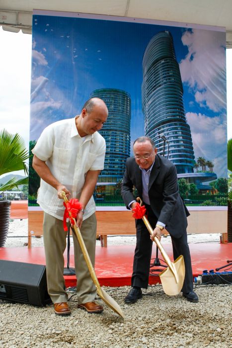 Jean Henri Lhuiller (left), and Carlos Yeung, board members of Diamond Hiland Inc. lead the groundbreaking of the 128 Nivel Hills project. (CDN PHOTO/CHOY ROMANO)