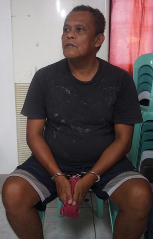 55-year old Sisino Merced Deiparine was captured during a continuous hot pursuit operation near his residence in Sitio Kilawan, Barangay Cansojong, Talisay City. (CDN PHOTO/CHRISTIAN MANINGO)