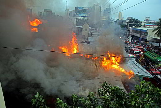 The fire was the second to hit the congested neighborhood since May 2012. (CDN PHOTO/LITO TECSON)