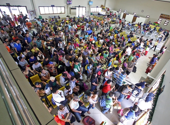 The passenger Terminal 1 at Pier 1 is crowded with passengers after some passengers for Manila waited for the arrival of vessels that were delayed. Some passengers were thankful that airconditioning units is fully fanctional but some are discomfort of their long wait.(CDN PHOTO/JUNJIE MENDOZA)
