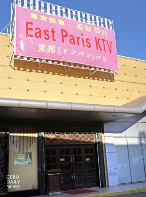 The signage of the new East Paris KTV in the North Reclamation Area has Korean characters which indicate who its target clients are. (CDN PHOTO/ JUNJIE MENDOZA)