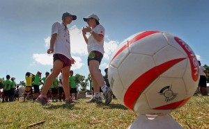 FIELD OF HOPE. Keren Lavi (right) and Naomi Golad of Mifalot, an Israeli humanitarian organization, teach football to 300 schoolchildren. The football training program is one of several methods used to help children recover from the trauma caused by Yolanda in northern Cebu. (CDN PHOTO/TONEE DESPOJO)