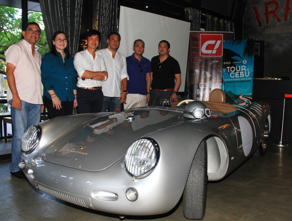 Organizers of the 1st Tour de Cebu rally (from left) Dr. Peter Mancao, Sophie delos Santos, Kenneth Cobonpue, Mike Jo, Pace president Red Durano and Jay Aldeguer stand behind a classic 1955 Porsche 550 Spyder after a press launch at the Irie Gastropubliko at the Cebu I.T. Park.  CDN PHOTO/BRIAN J. OCHOA