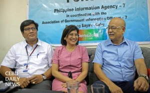 Lyndon Jayme, Veco assistant vice president for utilities and economics, (from left), Ma. Theresa Sederiosa, Veco reputation management manager, and Regional Director Antonio Labios of the Department of Energy share a light moment during a forum about national energy consciousness. (CDN PHOTO/LITO TECSON)