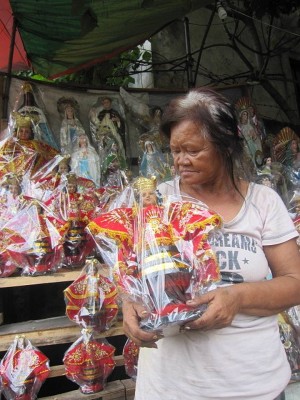BEST SELLER. Marcelino Concepcion, 60, shows a sample of the Sto. Niño image she sent to stores in Manila for the papal visit. (CDN PHOTO/ADOR VINCENT S. MAYOL)
