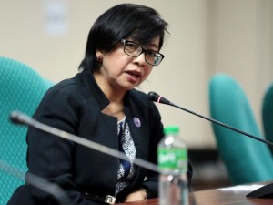 Government Peace Panel chairperson Miriam Coronel-Ferrer answers questions from reporters after the Bangsamoro committee hearing chaired by Senator Miriam Santiago on Monday. (INQUIRER PHOTO)