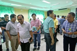 Talisay City councilors including former mayor Socrates Fernandez (3rd from left) smile as they leave the conference room of Cebu Gov. Hilario Davide III (rightmost). (CDN PHOTO/ JUNJIE MENDOZA)