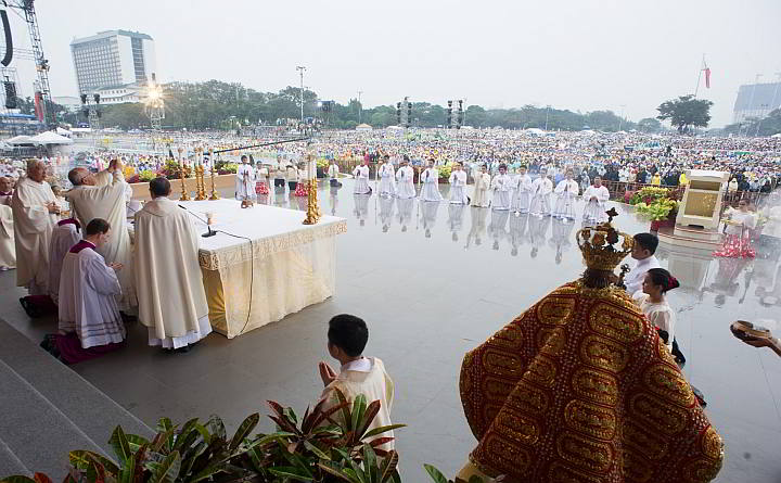 Pope Francis celebrates a Mass at Rizal Park. Millions filled Manila's main park and surrounding areas for Pope Francis' final Mass in the Philippines on Sunday, braving a steady rain to hear the pontiff's message of hope and consolation for the Southeast Asian country's most downtrodden and destitute. (AP Photo)