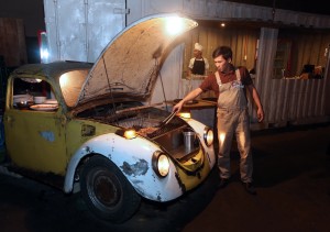 A Volkswagen Beetle’s front end is used as a grilling station for the diner’s delicious roasted specialties. CDN photo/Tonee Despojo