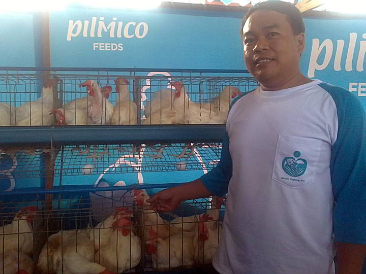 Raul Remulta of barangay Caputatan Norte, Daanbantayan town in Cebu shows the poultry and egg machines donated by Pilmico and RAFI.  (CDN Photo/Melissa Q. Cabahug)