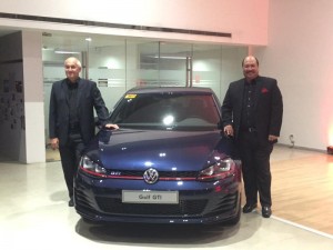 Volkswagen Philippines chief operating adviser Klaus Schadewald (left) and Volkswagen Philippines president and CEO John Philip Orbeta lead the launching of the new Golf GTI at the Volkswagen BGC showroom.  motioncars.inquirer.net 