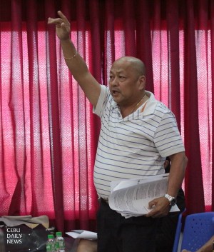 Dumanjug Mayor Nelson Garcia tried to explain his side during the board session. 