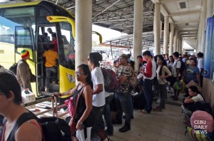 NEW YEAR RUSH/DEC. 28, 2013: Passengers and bus operators may heave a sigh of relief as Capitol assures that the Cebu South Bus Terminal will not be fully privatized. The plan is only for a partnership with a private entity, and the province will consult stakeholders. 