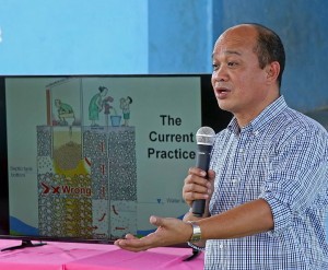 Lasaro "Boboy" Salvacion of MCWD presented the septage management plan to Corodva residents in Barangay San Miguel Sports complex. (CDN PHOTO/LITO TECSON)