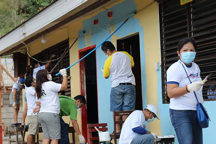 Veco employees rewire, repaint, repair and clean classrooms at the Budlaan Integrated School at the start of Brigada Eskwela 2015. (Contributed)