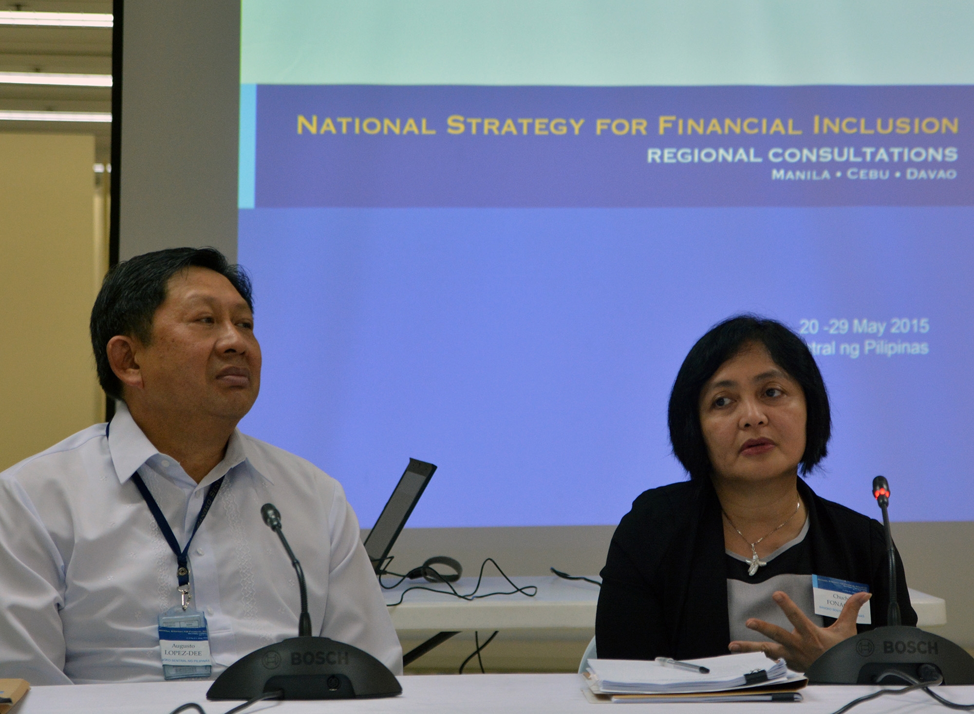 Chuchi G. Fonacier (right) and Augusto L. Dee, Banko Sentral ng Pilipinas managing directors, explain the national Strategy for financial inclusion of a press briefing. 
