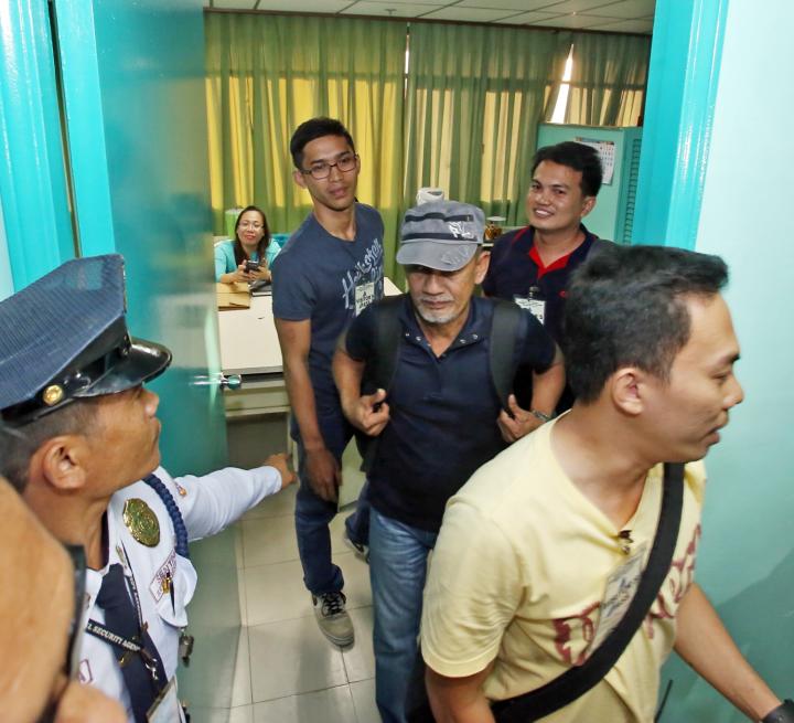 NO LUCK. Lowell Sanchez (at right back), union president accompanied by officers of the Alliance of Progressive Labor as they walk out of a room after meeting with the management of Korean Power Corp. at the National Conciliation and Mediation Board (NCMB) office. (CDN PHOTO/ JUNJIE MENDOZA)