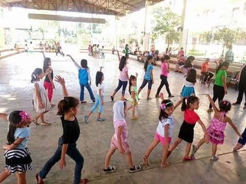Children practice a dance number in a Cebu City barangay gym. (Contributed photo/Pearl Therese Aton)