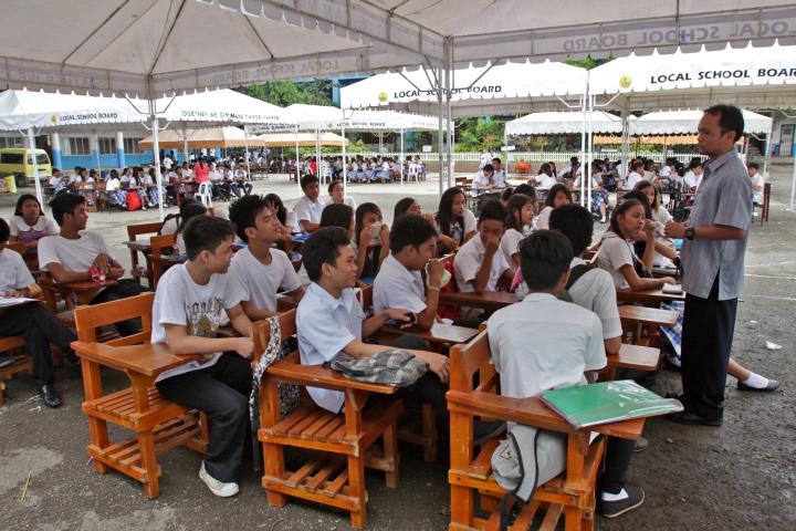 High school students of Gothong National Highschool attend classes under tents from the Cebu City government in this November 2013 file photo.