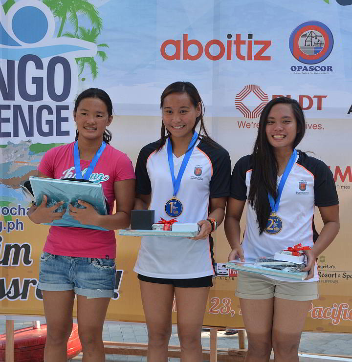 Michael Ichiro Kong (top) the 6k male competitive champion. Right photo, the top three finishers in the women’s 6k: Karen Mae Indaya - 3rd place; Loren Dale Echavez - 1st place and Pia Ordinal - 2nd place with their awards.  (CDN PHOTO/ Christian Maningo)