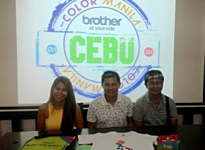 From left to right, Color Manila Runs's Justine Cordero, Jay Em and race director Joel Juarez show off the singlet for the upcoming running event in a press conference. (Glendale Rosal)