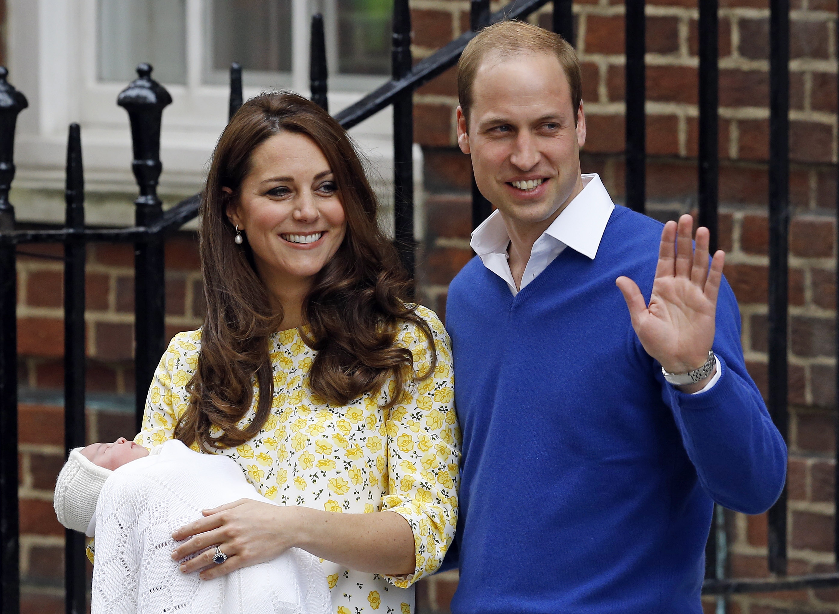 Britain's Prince William and Kate, Duchess of Cambridge and their newborn baby princess, pose for the media as they leave St. Mary's Hospital's exclusive Lindo Wing, London, Saturday, May 2, 2015.  Kate, the Duchess of Cambridge, gave birth to a baby girl on Saturday morning.   (AP Photo/Kirsty Wigglesworth)