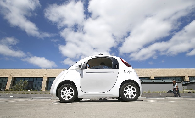 Google’s new self-driving prototype car is presented during a demonstration at the Google campus in Mountain View, Calif. The latest models of Google’s self-driving cars are now cruising the streets near the Internet company’s Silicon Valley headquarters in a test of how they work around other vehicles driven by people. (AP)