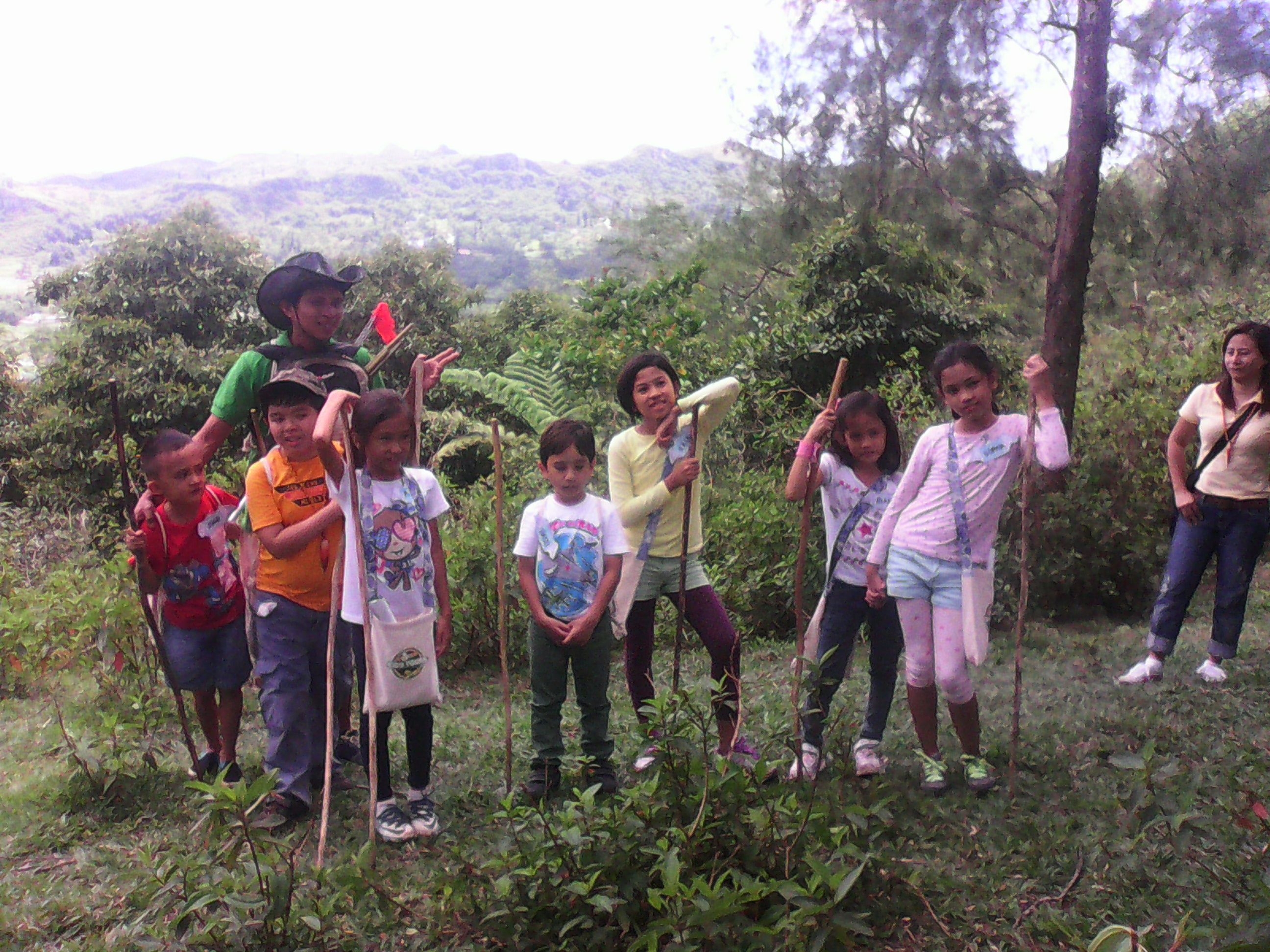 Children reach the Osmeña Peak in barangay Mantalongon, Dalaguete after a long trek.(Contributed)