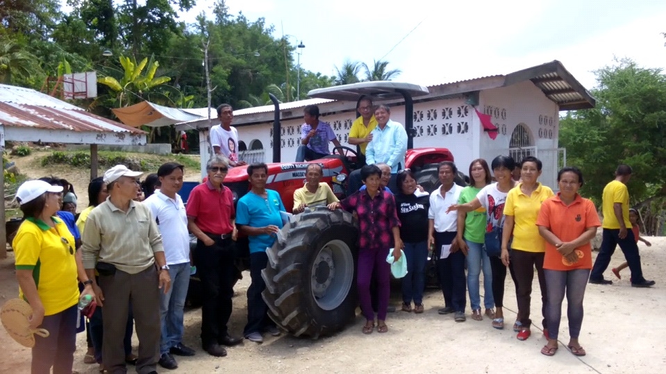 Cebu Provincial Agrarian Reform officials with Rep. Benhur Salimbangon of Cebu's 4th District, Bogo City Vice Mayor Santiago Sevilla and Anonang Norte barangay chairperson Josefina Balais during the turnover ceremony.(CONTRIBUTED)
