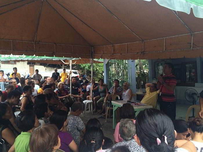 Some of the affected residents of the scheduled demolition met with baranga Capitol Site barangay captain Manuel Guanzon and their lawyer Reymelio Delute to discuss their plans for tomorrow's demolition. (CDN PHOTO/ JOSE SANTINO BUNACHITA)