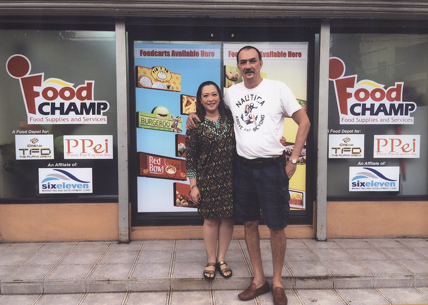 Ramon Fernandez (right) and his wife Karla has invented P1.6 million in a food cart business.(CONTRIBUTED)