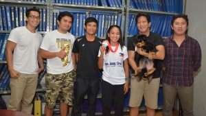Tabal (4th from left) and her trainer John Philip Dueñas (3rd from left) pose with members of the CDN sports staff (from left) Editorial Assistant Calvin Cordova, Sports Copy Editor Brian Ochoa, Sports Editor Rick Gabuya (holding Cogie) and sports reporter Glendale Rosal.(CDN/CHRISTIAN MANINGO)