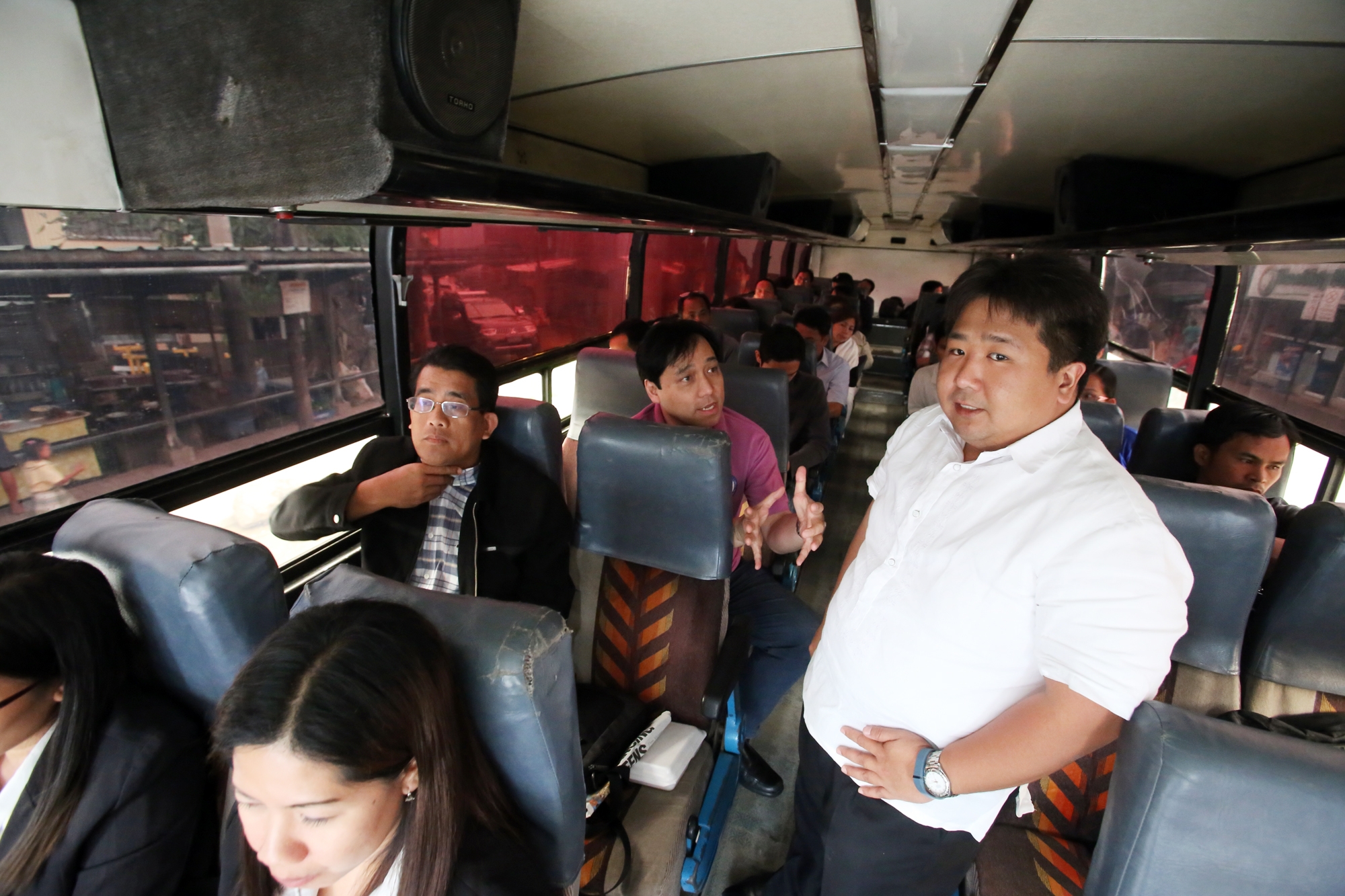 BRT Cebu manager Rafael Yap accompanies Winston Ginez, Land Transportation Franchising and Regulatory Board (LTFRB) chairman and LTFRB member Antonio Ariel Enrile Inton (center) in inspecting the BRT route inside a Kaohsiung bus from barangay Tabunok, Talisay City to barangay Talamban, Cebu City in this January 2015 file photo.
