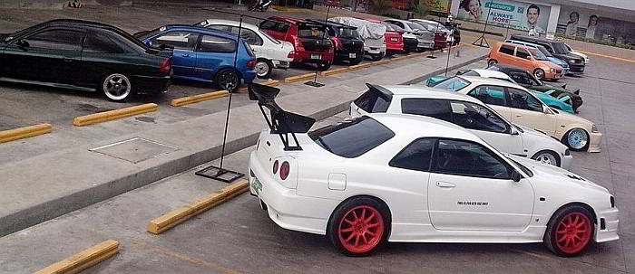 Different customized cars are displayed at the parking area of the South Town Centre in Talisay City. (CONTRIBUTED PHOTO)