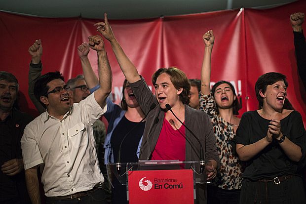 The leader of the lefties coalition Barcelona Together, Ada Colau, center, celebrates the victory of her party after elections in Barcelona, Spain in this May 24 Photo. 