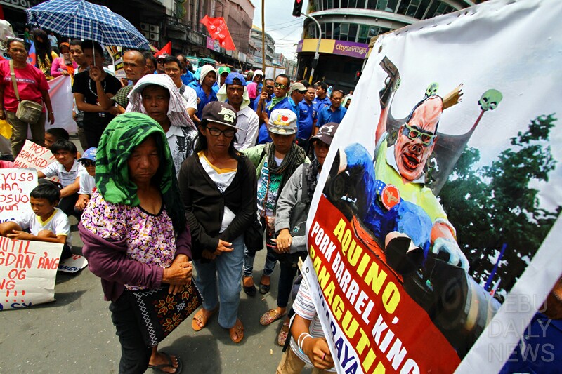 SONA RALLY/JULY 27,2015: Militants group is not happy with the administartion of President Benigno Aquino III during a rally along Colon in Cebu City to coencide the SONA of the president. (CDN PHOTO/TONEE DESPOJO)