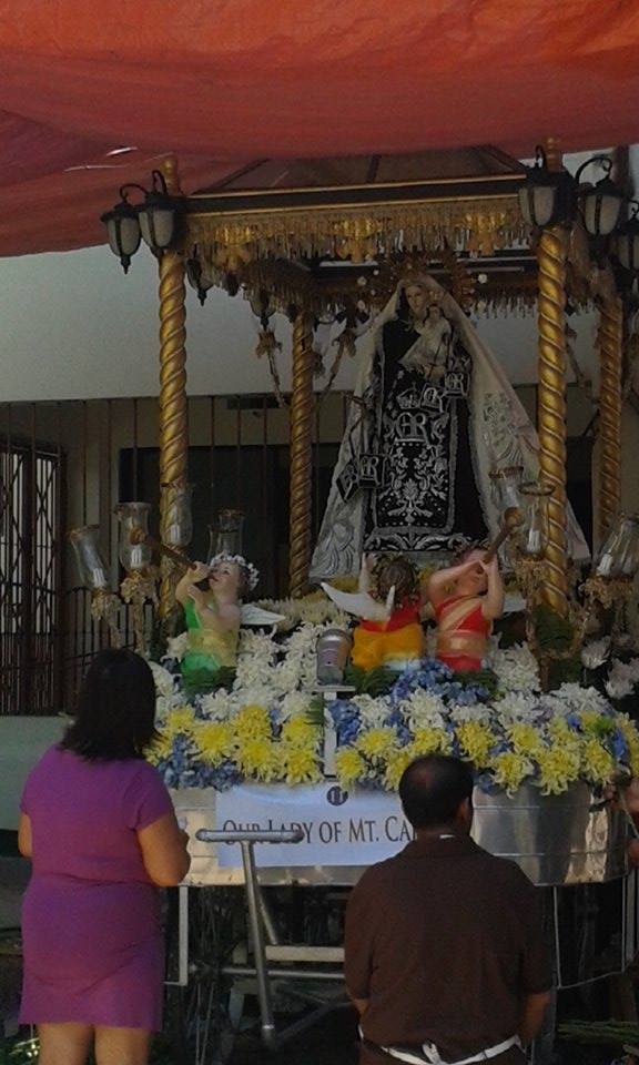 The image of Our Lady of Carmelites is being prepared for today's foot procession. (CDN PHOTO/ ADOR MAYOL)