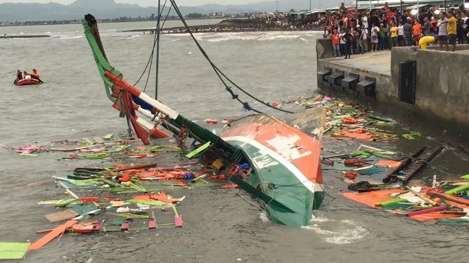 Shattered parts of the  MB Kim Nirvana-B are towed  to Ormoc City after the boat capsized in big waves less than a kilometer from the pier on July 1.(FB POST/RYAN CHRISTOPHER SOROTE)