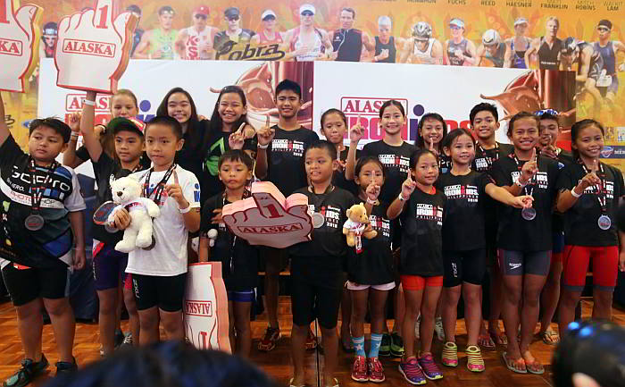  Winners of this year’s  Alaska Ironkids pose with their trophies and medals during the  meet the champions at the Marquee of Shangri-la's Mactan Resort and Spa yesterday.(CDN PHOTO/ JUNJIE MENDOZA)
