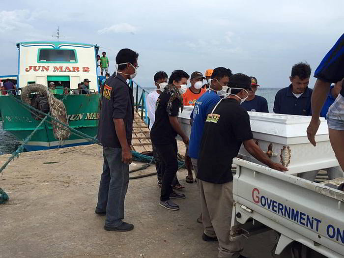 Nearly three days after the tragedy, the survivors of the ill-fated MB Kim Nirvaba-B went home to Pilar Island, Camotes Cebu on board a BRP Batanes vessel Sunday (Photo by Ryan Christopher Sorote)