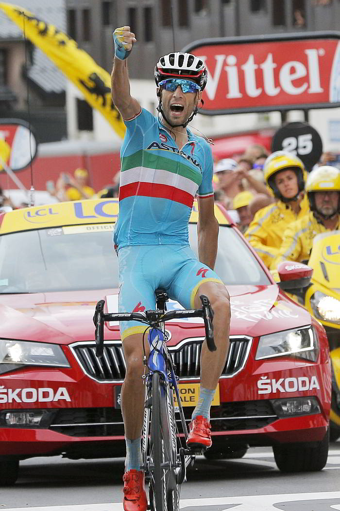 Italy's Vincenzo Nibali celebrates as he crosses the finish line to win the 19th stage of the Tour de France.