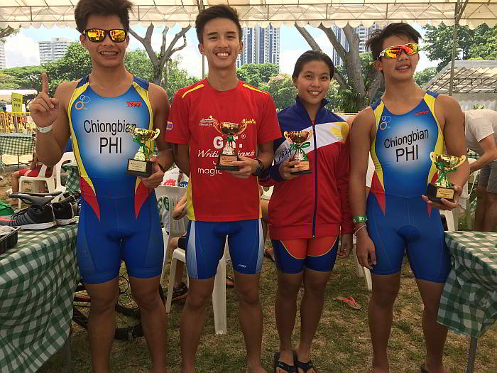 The four Cebuano junior triathletes who took the Singapore International Triathlon by storm with their trophies (from left) Justin Chiongbian (16-19 gold), Ralph Eduard So (14-15 bronze), Aaliyah Mataragnon (14-15 bronze) and Yuan Chiongbian (14-15 gold).   (Contributed)