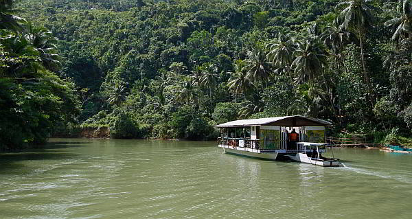 Floating restaurants like this cruise the Loboc River in Bohol, a popular tourist experience. (CDN FILE PHOTO)