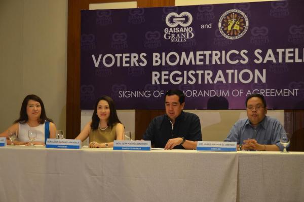 Genevieve Gaisano-Go, executive vice president; Geraldin-Anggala president; Comelec chairman Juan Andres Bautista; and James Jimenez, Comelec director of education and information at the signing of the Memorandum of Agreement for a partnership for biometrics. (CONTRIBUTED PHOTO)