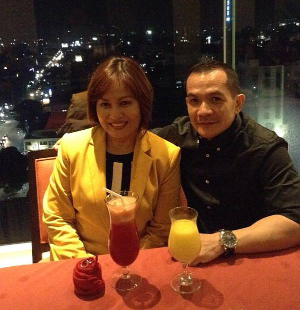 Cebu City Asst. Prosecutor Mary Ann Castro and Leodegredo Sanchez   at a reception after their Muslim wedding. (CONTRIBUTED PHOTO)