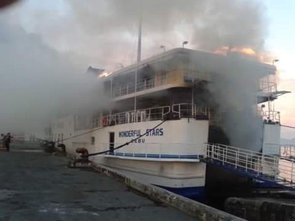 MV Wonderful stars caught fire while docked at Ormoc port. (CONTRIBUTED PHOTO/ STEVEN FERRAREN)