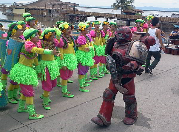 The Pilipog Elementary School contingent clad in pink and neon green costumes won the dance showdown in the 3rd Cordova Dinagat Festival.  (CDN PHOTO/NORMAN MENDOZA)