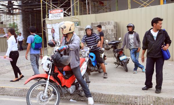 Motorcycles for hire of habal-habal drivers earned extra income fetching commuters stranded by sudden route change that saw jeepneys vanish from their usual routes near SM City. (CDN PHOTO/ TONEE DESPOJO)
